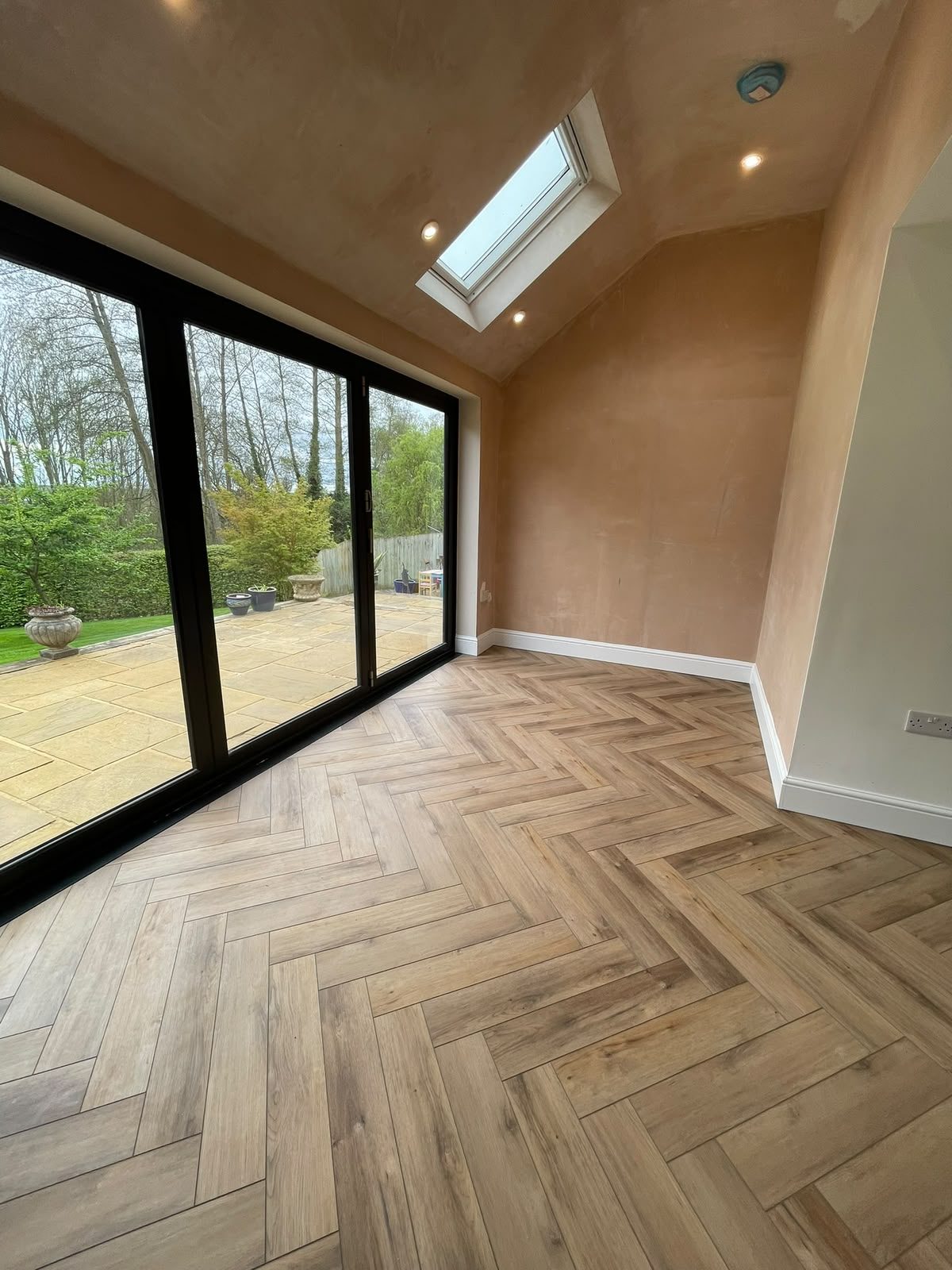 single-storey extension with rooflight and sliding doors