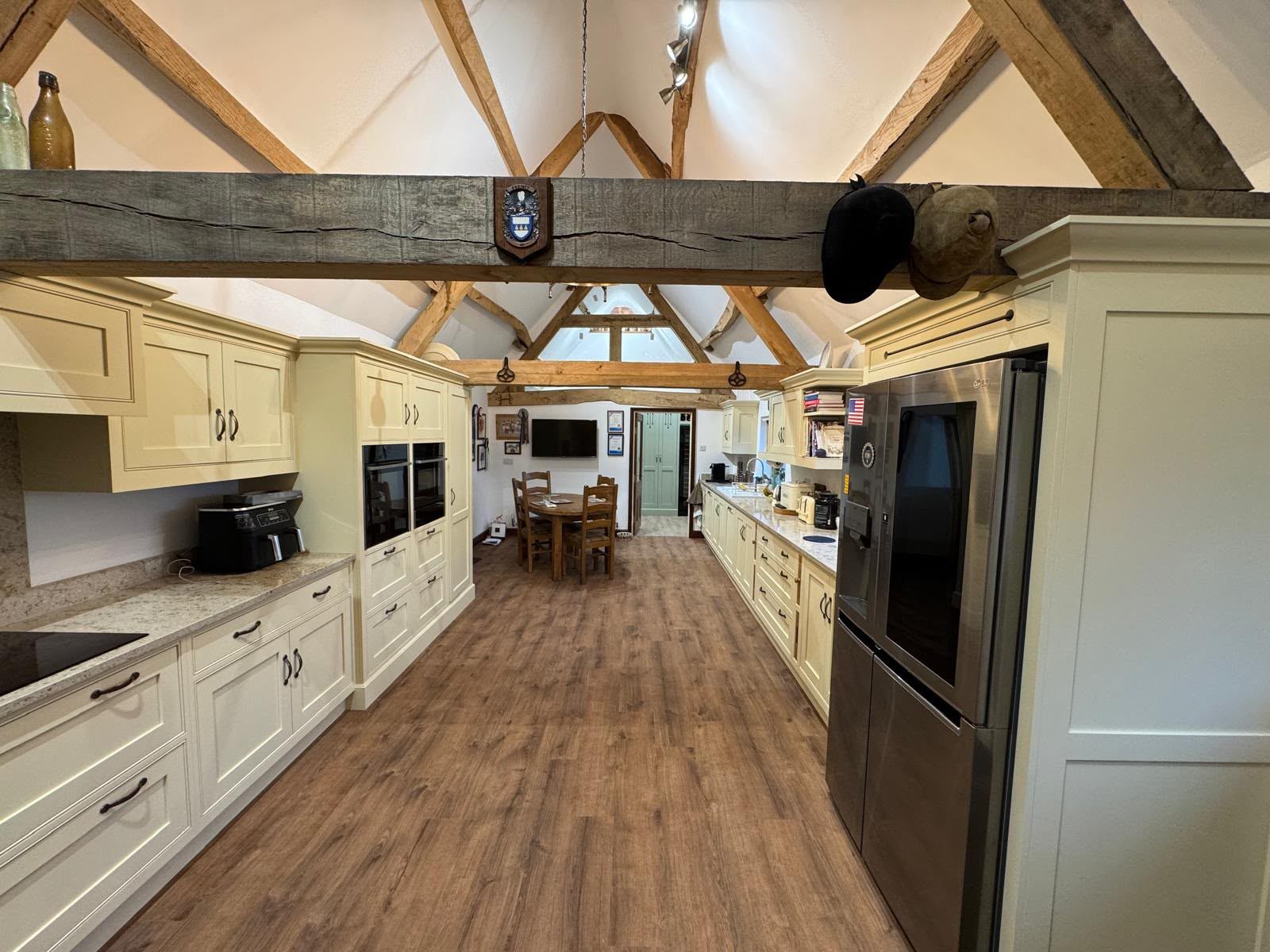 shaker kitchen under oak beams