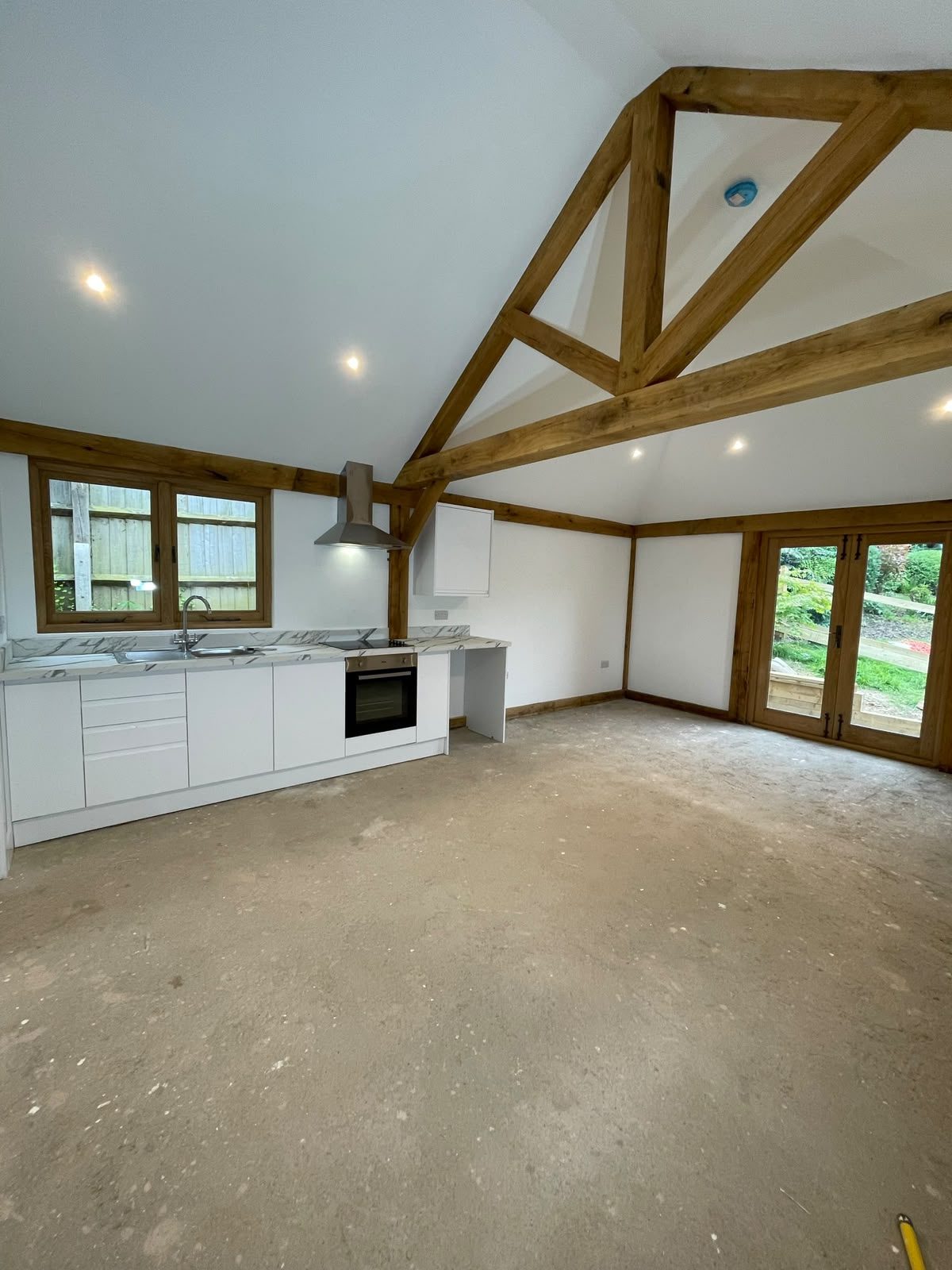oak frame annex kitchen with vaulted ceiling