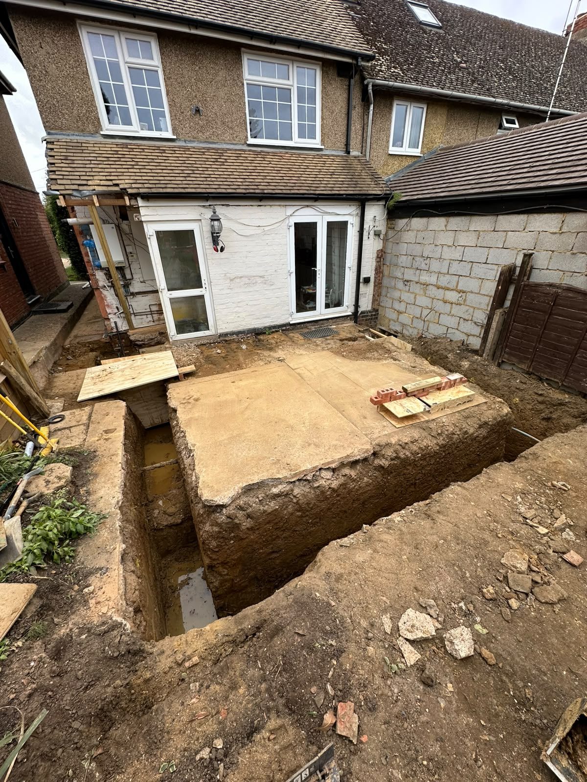 excavated foundations for a rear extension