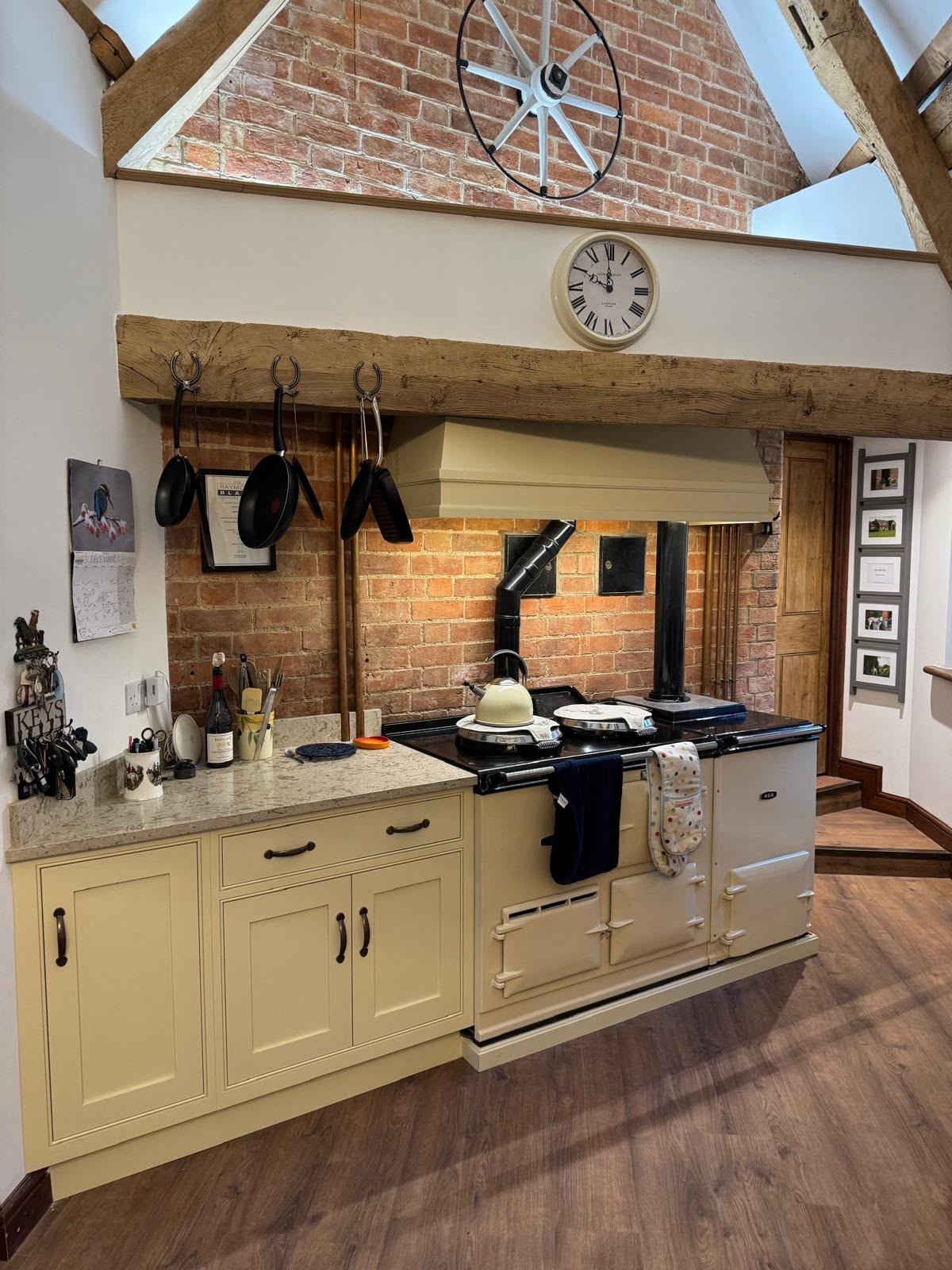 kitchen with range cooker and brick chimney