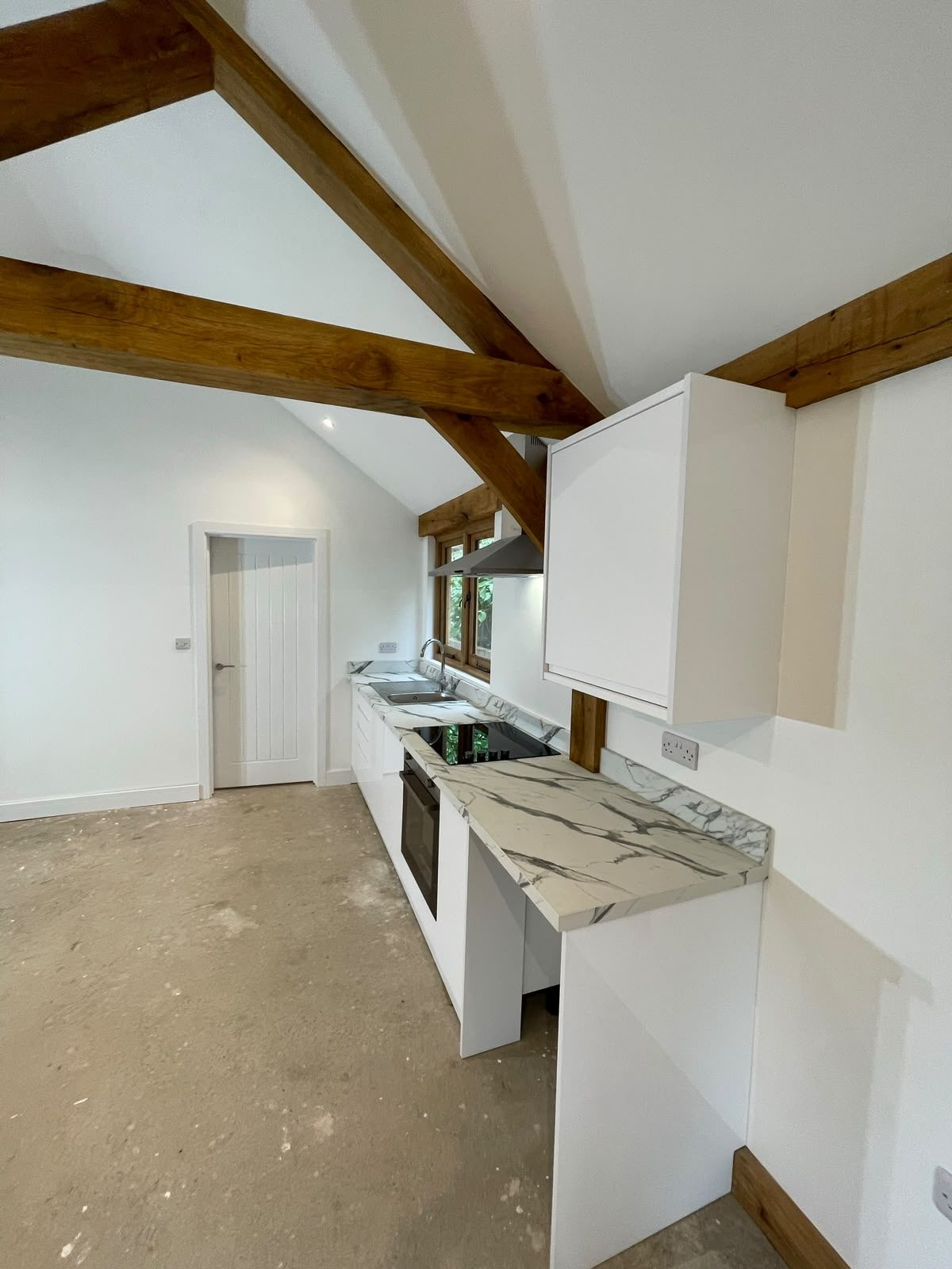 annex kitchenette under exposed oak beams