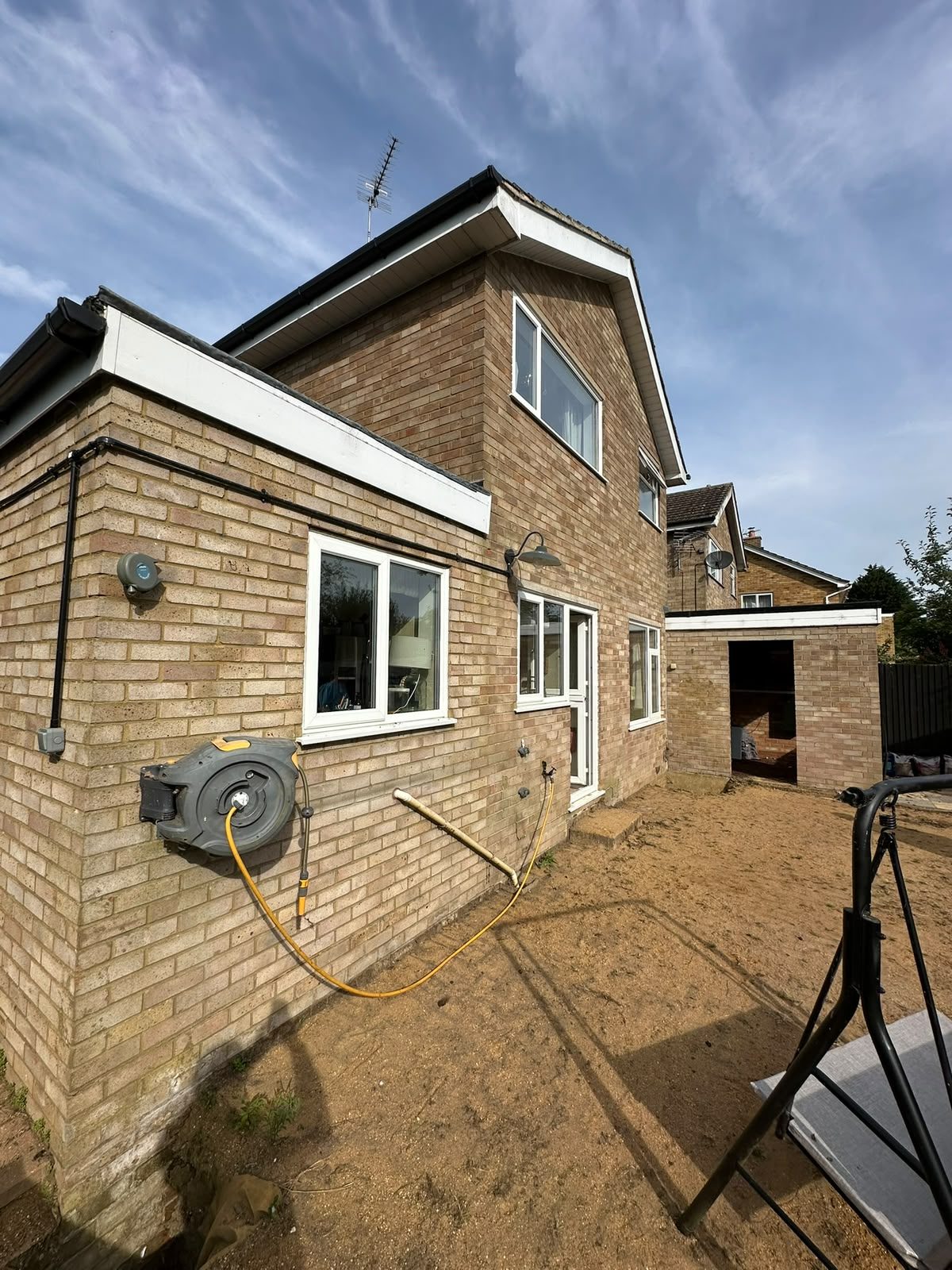 single-storey rear extension on brick house