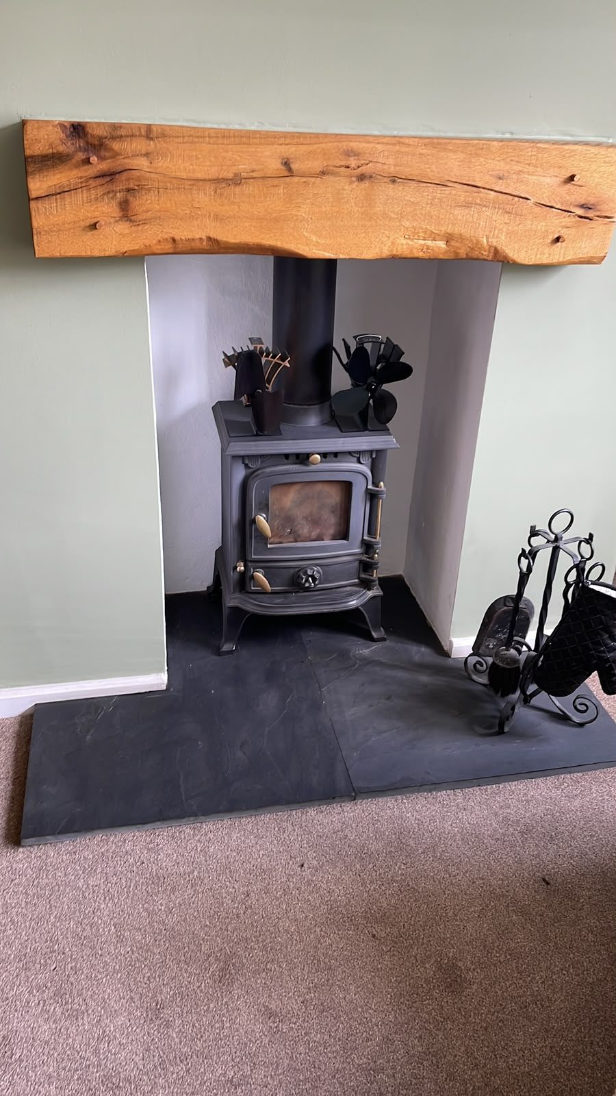 renovated fireplace with log burner