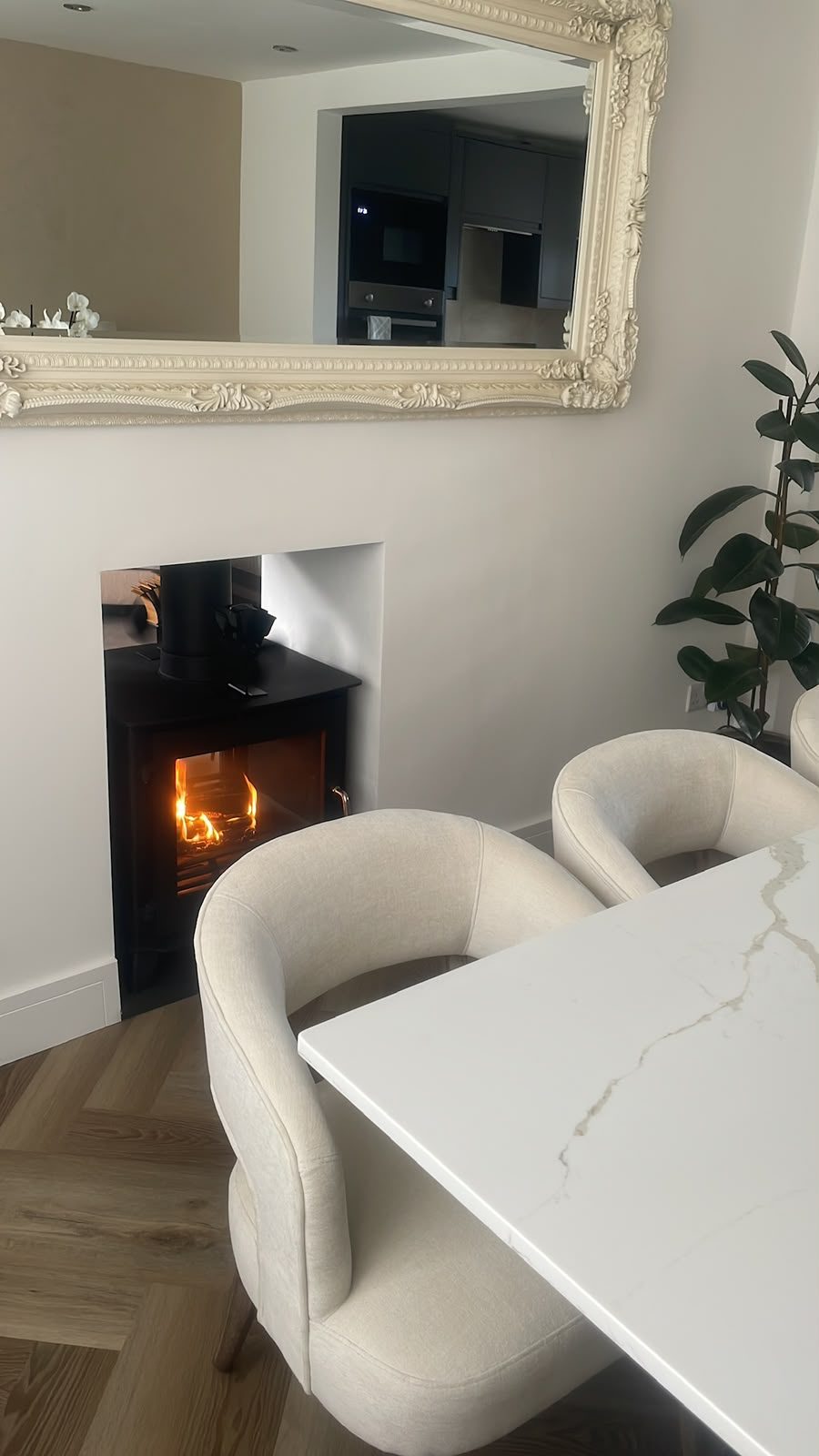 renovated dining area with wood burner