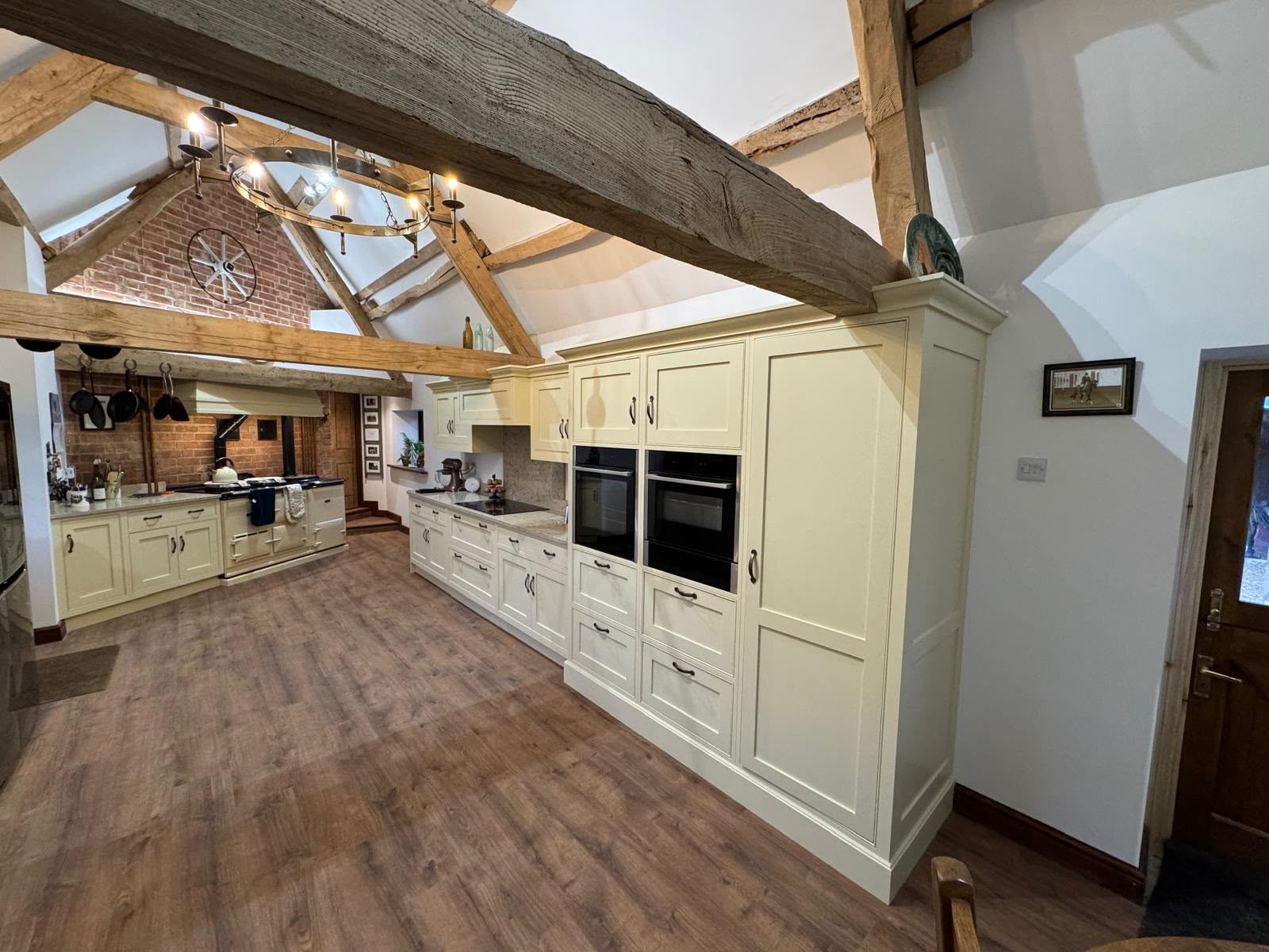 farmhouse kitchen under exposed beams