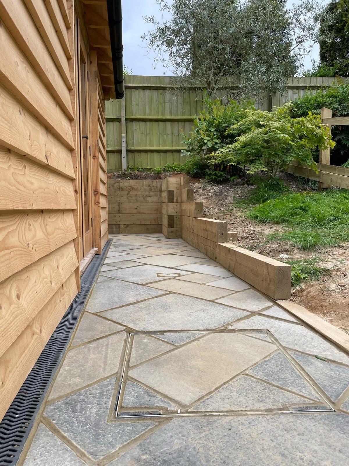 timber-clad annex and new stone path
