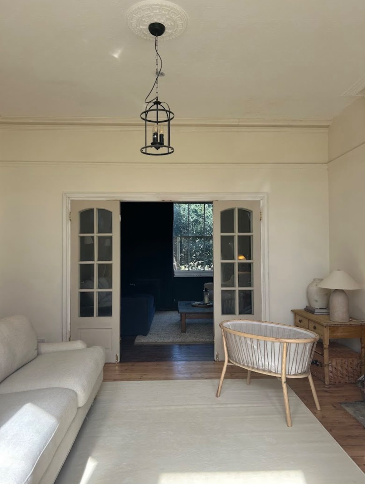 living room opened up with French doors