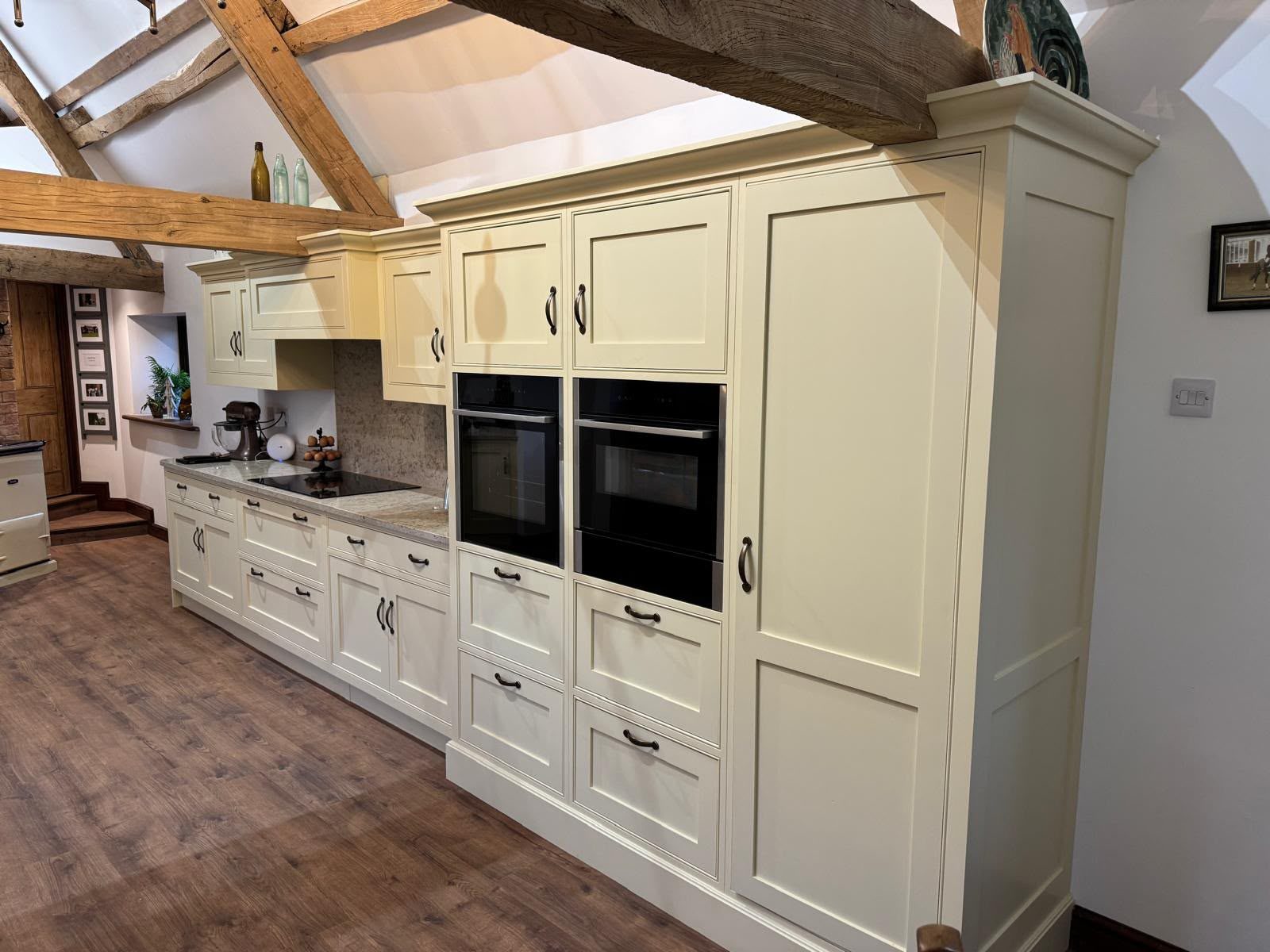 shaker kitchen with built-in ovens